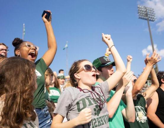 Ohio University Students cheering at a football game